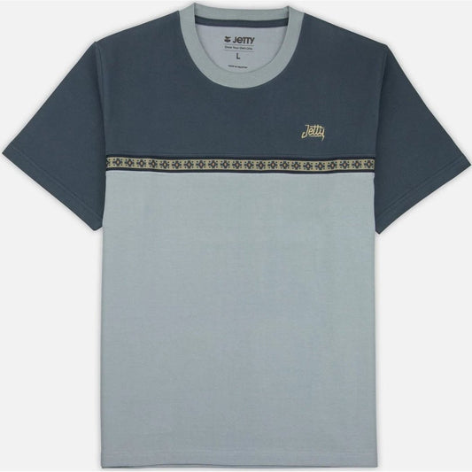 Front view of the Jetty Mens Ember Knit Tee in Blue showing the color-blocked design and small logo on the chest.