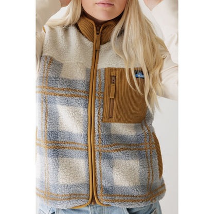 Front view of the Kavu Ozette women's vest in Horizon Plaid with a brown corduroy pocket and a model wearing it.