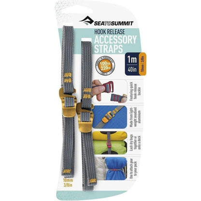 Side view of Sea To Summit Accessory Straps with Hook Release in 10mm showing the gold buckles and packaging against a white background.