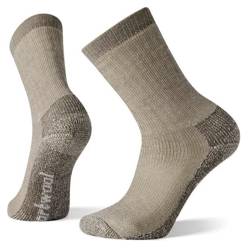 Side view of the Smartwool Classic Hike Extra Cushion Crew socks in Navy showing the cushioned heel and toe against a white background.