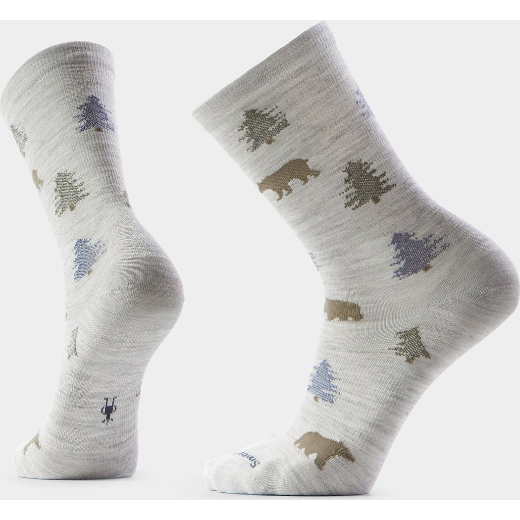 Front and side view of the Smartwool Everyday Through the Trees Crew Socks in Ash showing bear and tree patterns against a white background.